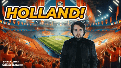 A Man Stands In Front Of A Stadium That Says Holland On The Top GIF