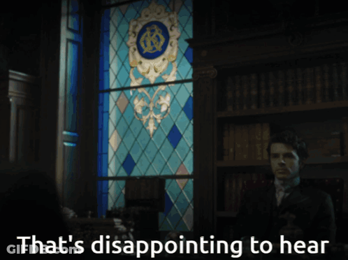 A Man Stands In Front Of A Stained Glass Window With The Words That 'S Disappointing To Hear GIF