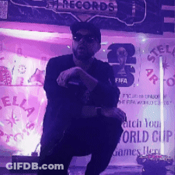 A Man Stands In Front Of A Stella Records Sign GIF