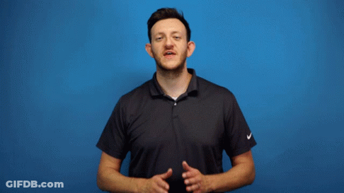 A Man Stands In Front Of A Thank You Sign GIF
