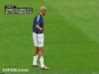 A Man Stands In Front Of A Tv Screen That Says Tsn On It GIF