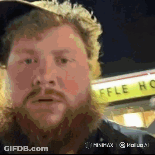 A Man Stands In Front Of A Waffle House GIF