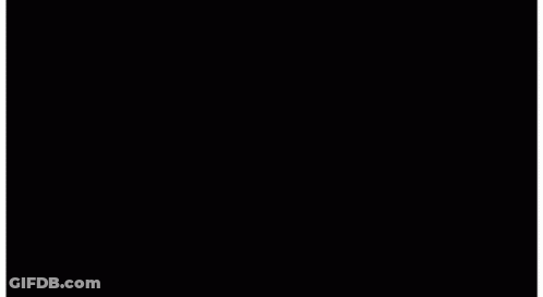 A Man Stands In Front Of A Wall That Says Zions Bank On It GIF