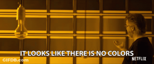 A Man Stands In Front Of A Wall With The Words It Looks Like There Is No Colors Netflix GIF