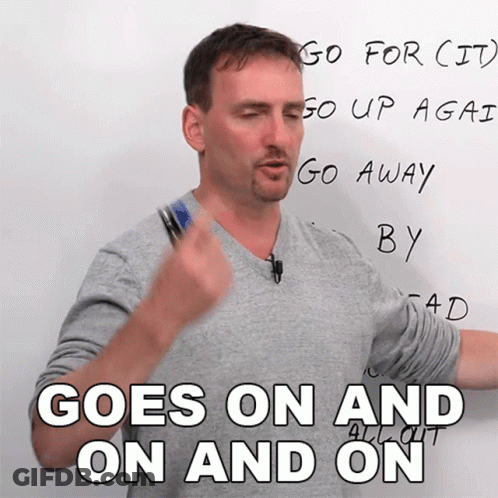 A Man Stands In Front Of A White Board And Says " Goes On And On " GIF