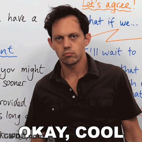 A Man Stands In Front Of A White Board That Says " Let 'S Agree " On It GIF