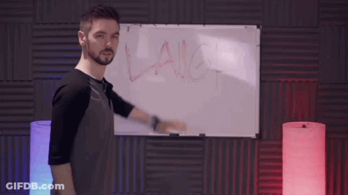 A Man Stands In Front Of A White Board With The Word Laugh Written On It GIF