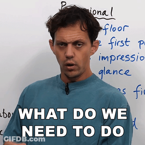 A Man Stands In Front Of A White Board With The Words " What Do We Need To Do " GIF