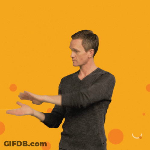 A Man Stands In Front Of An Orange Background With The Words " Don 'T Tell Me What To Do " Written On It GIF