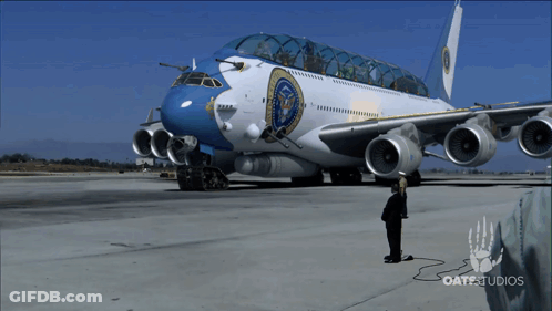 Man Next To Oatestudios Airplane GIF