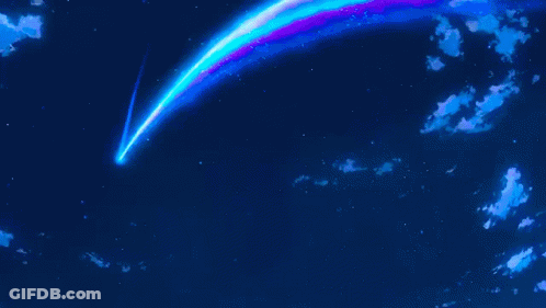 A Man Stands On A Rooftop Looking Up At A Blue Sky GIF