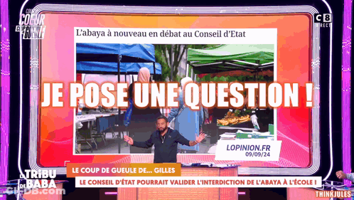 A Man Stands On A Stage In Front Of A Sign That Says Je Pose Une Question GIF