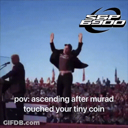 A Man Stands On A Stage With His Arms In The Air And The Words " Ascending After Murad Touched Your Tiny Coin " GIF