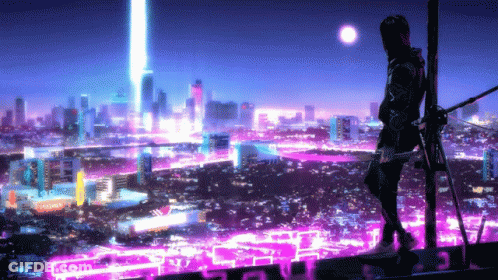 A Man Stands On Top Of A Building Overlooking A City At Night With A Sign That Says ' Coca Cola ' On It GIF