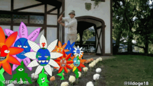 A Man Swings A Golf Club In Front Of A Bunch Of Flowers With One That Says Lease GIF