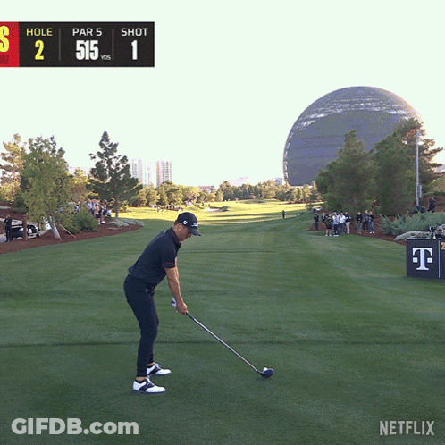 A Man Swings A Golf Club On A Golf Course With A Netflix Logo In The Corner GIF