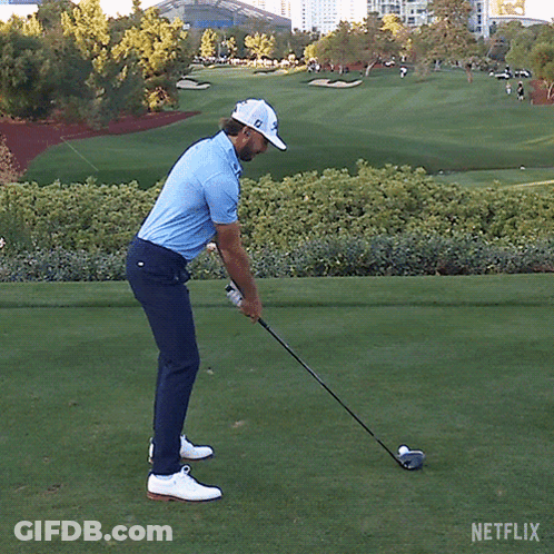 A Man Swings A Golf Club On A Golf Course With Netflix Written On The Bottom GIF