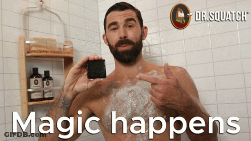 A Man Taking A Bath With The Words " Magic Happens " Written On The Bottom GIF