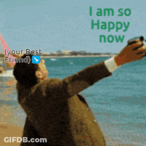 A Man Taking A Picture Of Himself On The Beach With The Words I Am So Happy Now Above Him GIF