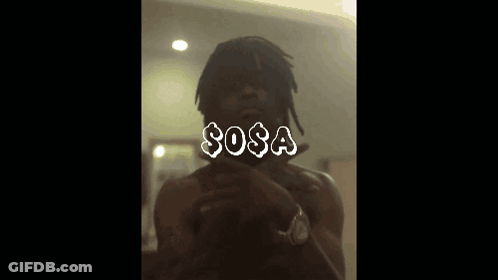 A Man Taking A Picture Of Himself With The Word Sosa Written On It GIF