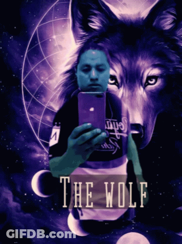 A Man Taking A Selfie In Front Of A Wolf With The Word The Wolf On The Bottom GIF