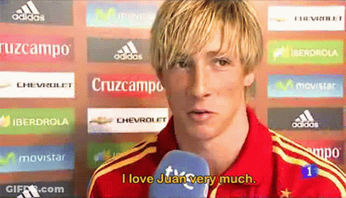 A Man Talking Into A Microphone With The Words I Love Juan Very Much GIF