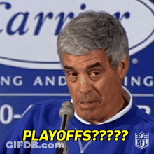 A Man Talking Into A Microphone With The Words Playoffs On The Bottom GIF