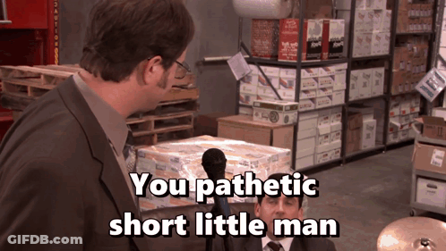 A Man Talking Into A Microphone With The Words You Pathetic Short Little Man GIF
