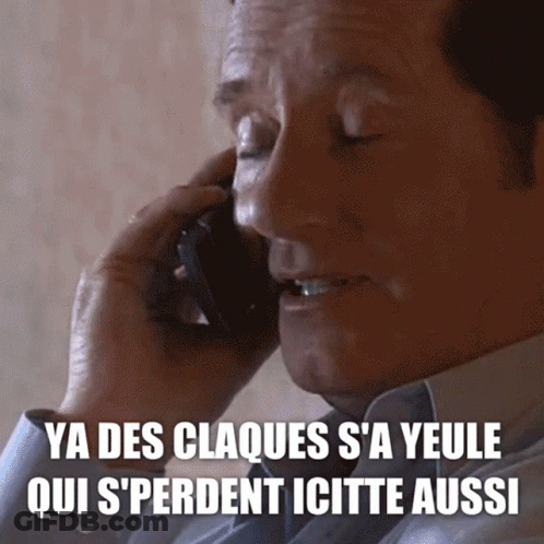 A Man Talking On A Cell Phone With A Caption That Says Ya Des Claques S ' A Yeule GIF