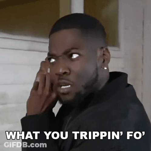 A Man Talking On A Cell Phone With The Caption What You Trippin ' Fo GIF