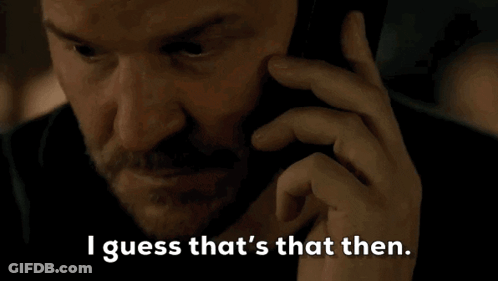 A Man Talking On A Cell Phone With The Words " I Guess That 'S That Then " Below Him GIF