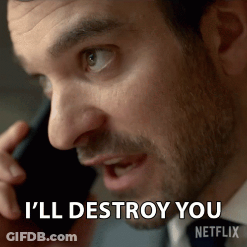 A Man Talking On A Cell Phone With The Words I 'Ll Destroy You On The Bottom GIF