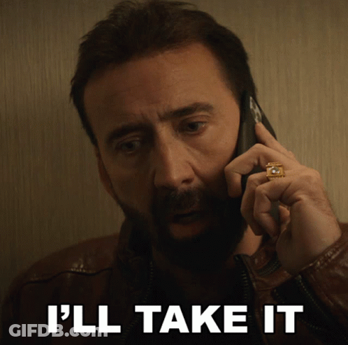 A Man Talking On A Cell Phone With The Words I 'Ll Take It Behind Him GIF