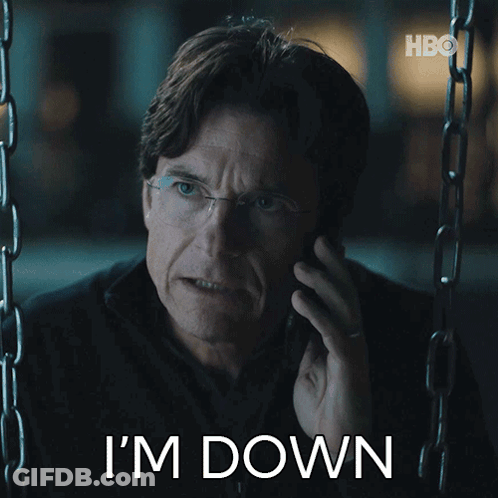 A Man Talking On A Cell Phone With The Words " I 'M Down " Next To Him GIF