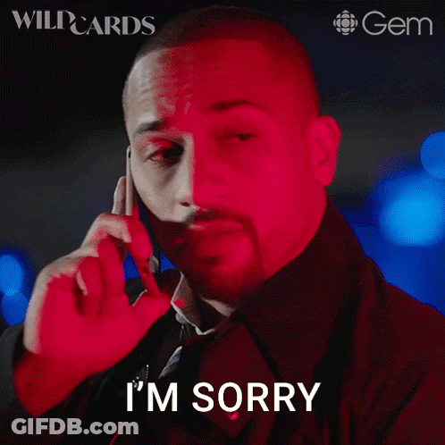 A Man Talking On A Cell Phone With The Words I 'M Sorry On His Face GIF