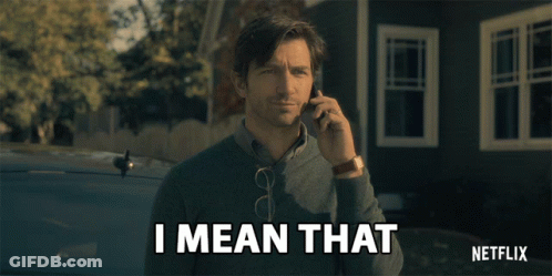 A Man Talking On A Cell Phone With The Words " I Mean That " Above Him GIF