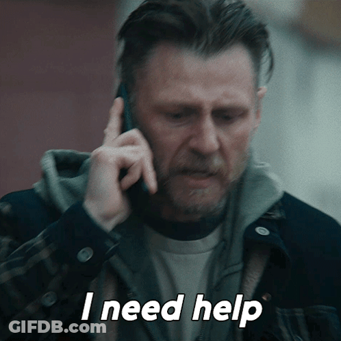 A Man Talking On A Cell Phone With The Words I Need Help Above Him GIF