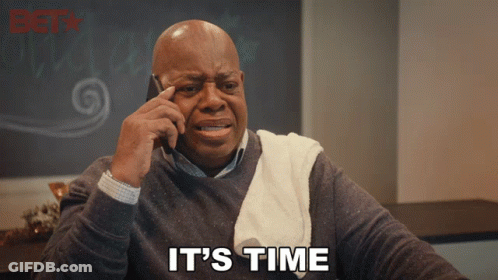 A Man Talking On A Cell Phone With The Words " It 'S Time " Above Him GIF