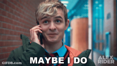 A Man Talking On A Cell Phone With The Words " Maybe I Do " Above Him GIF