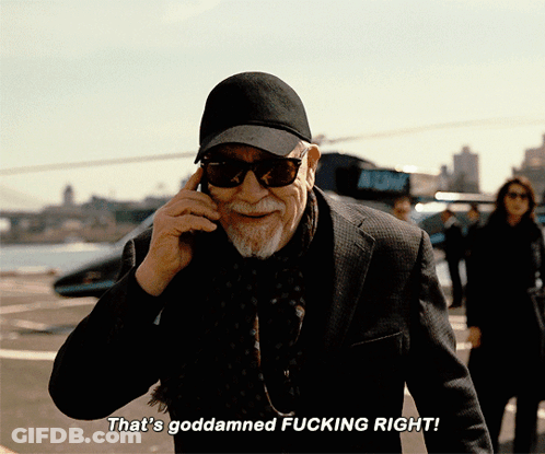 A Man Talking On A Cell Phone With The Words That 'S Goddamned Fucking Right Below Him GIF
