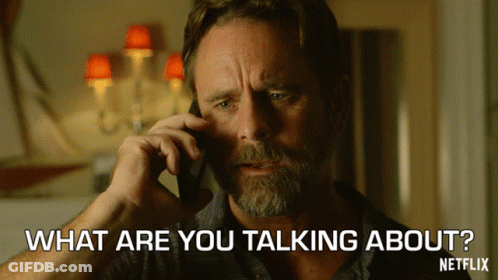 A Man Talking On A Cell Phone With The Words What Are You Talking About Written Below Him GIF