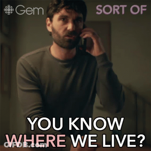 A Man Talking On A Cell Phone With The Words You Know Where We Live GIF