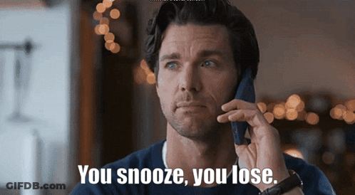 A Man Talking On A Cell Phone With The Words You Snooze You Lose GIF