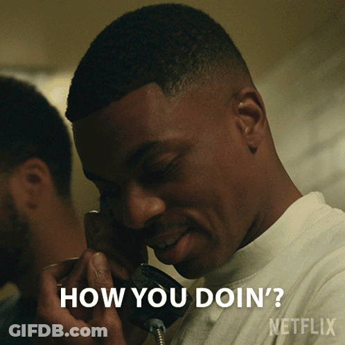 A Man Talking On A Phone With The Words How You Doin ' Netflix Written Below Him GIF