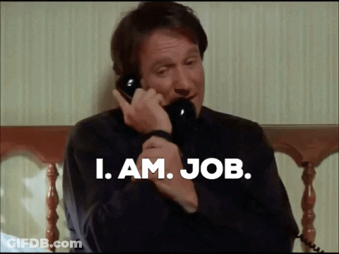 A Man Talking On A Phone With The Words " I Am Job " Written Below Him GIF