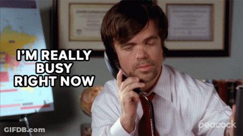A Man Talking On A Phone With The Words I 'M Really Busy Right Now GIF