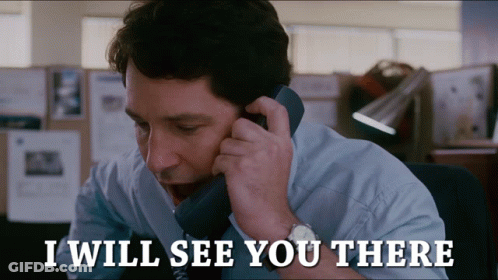 A Man Talking On A Phone With The Words " I Will See You There " Above Him GIF