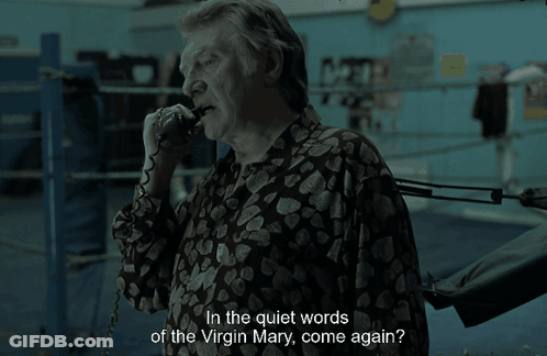 A Man Talking On A Phone With The Words " In The Quiet Words Of The Virgin Mary Come Again " GIF