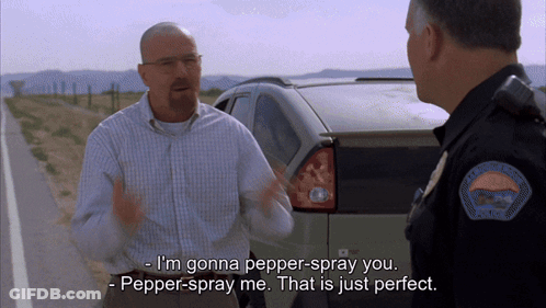 A Man Talking To A Police Officer Who Says I 'M Gonna Pepper Spray You GIF