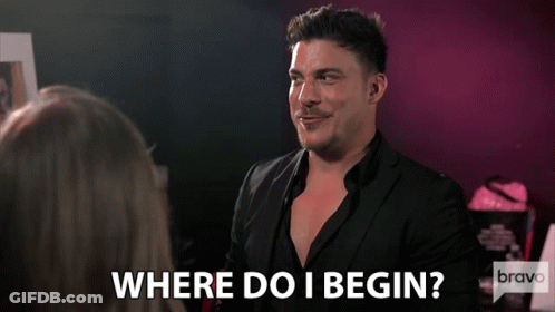 A Man Talking To A Woman With The Words Where Do I Begin GIF